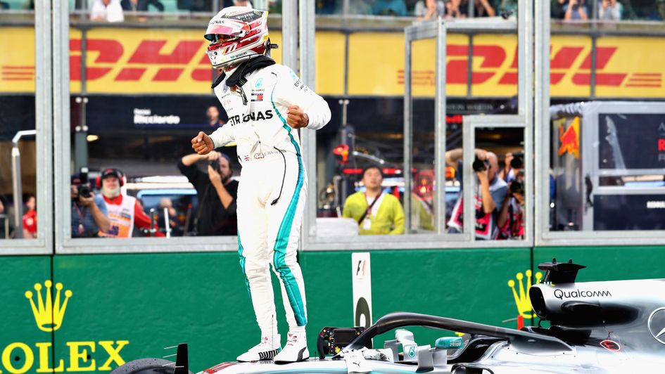 Lewis Hamilton celebrates another pole position
