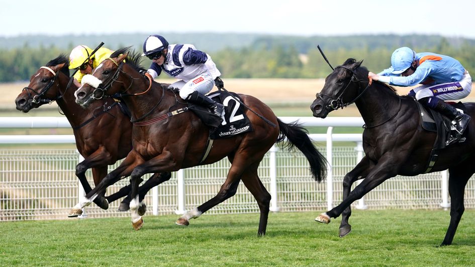 Prairie Falcon ridden by jockey Hollie Doyle (centre) wins the Jaeger Lecoultre Nursery Handicap