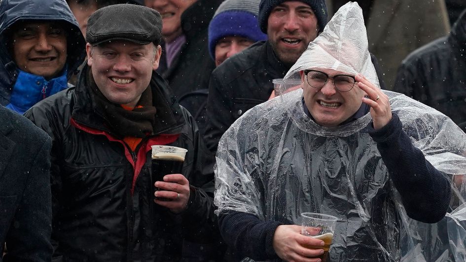 Racegoers will attempt to keep dry today