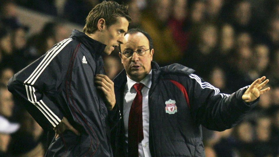 Peter Crouch (left) receives instructions from Rafa Benitez in 2006