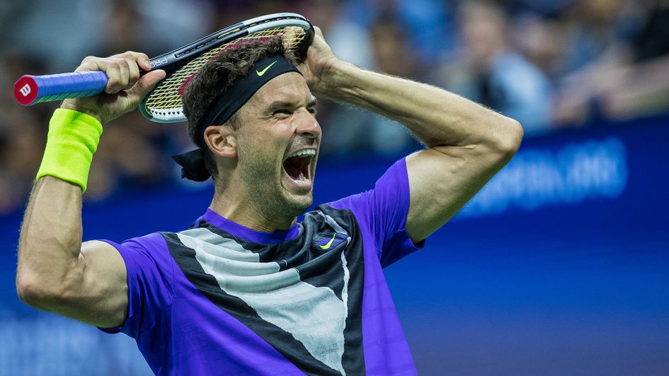 Grigor Dimitrov celebrates his shock win over Roger Federer