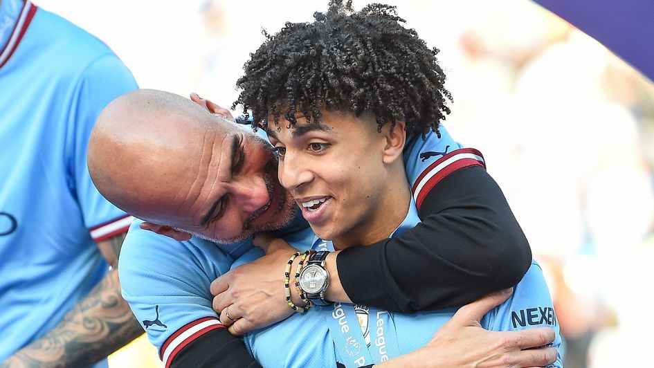 Pep Guardiola and Rico Lewis