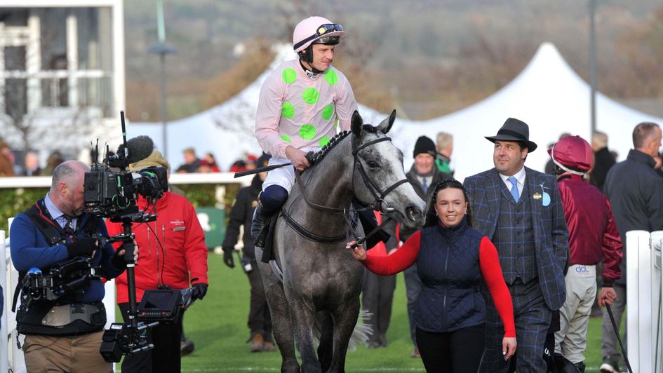 Joe Chambers walks into the Cheltenham winners' enclosure with Lossiemouth