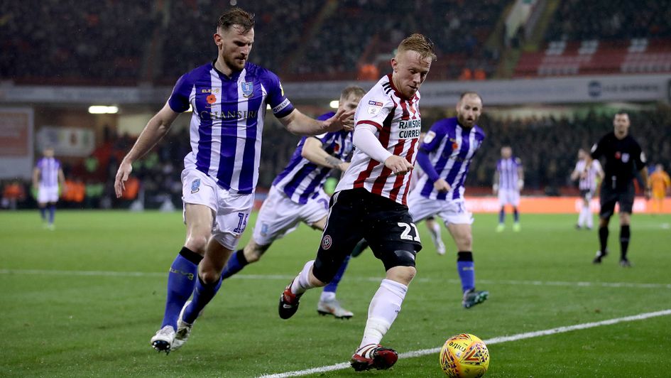 Tom Lees (left) in action at Bramall Lane