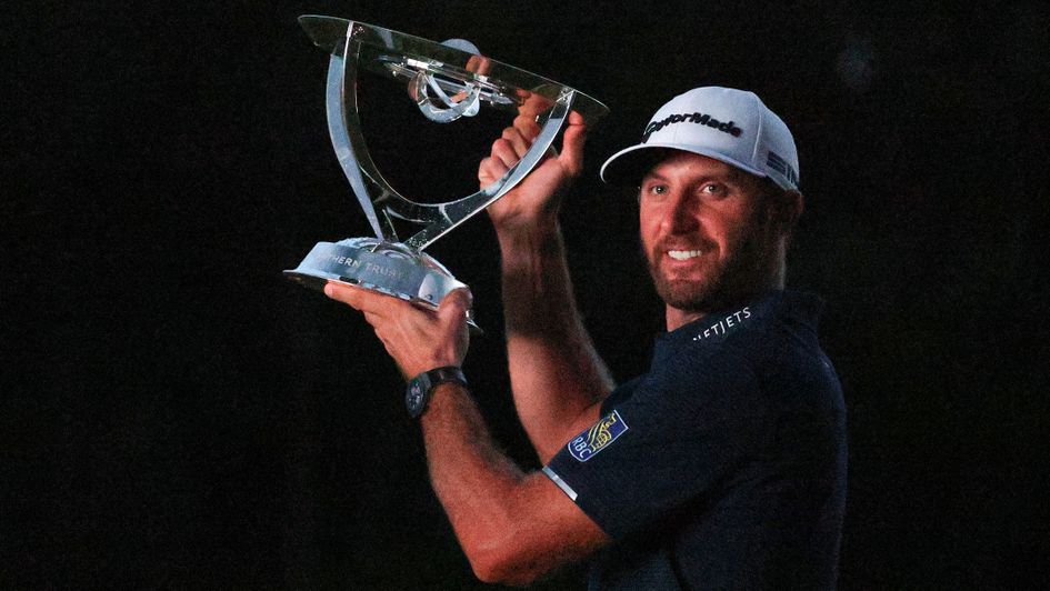 Dustin Johnson with the Northern Trust Open trophy