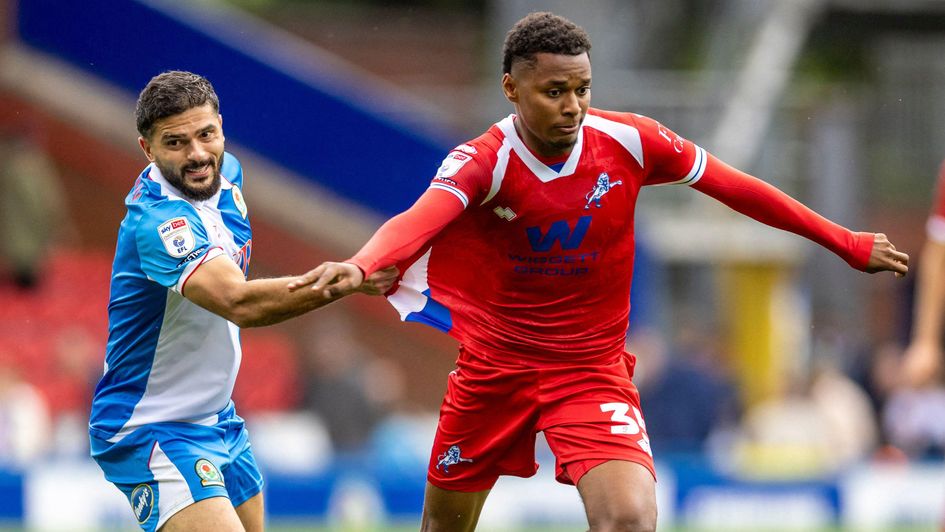 Blackburn's Sam Morsy with a fist-full of an opponents shirt