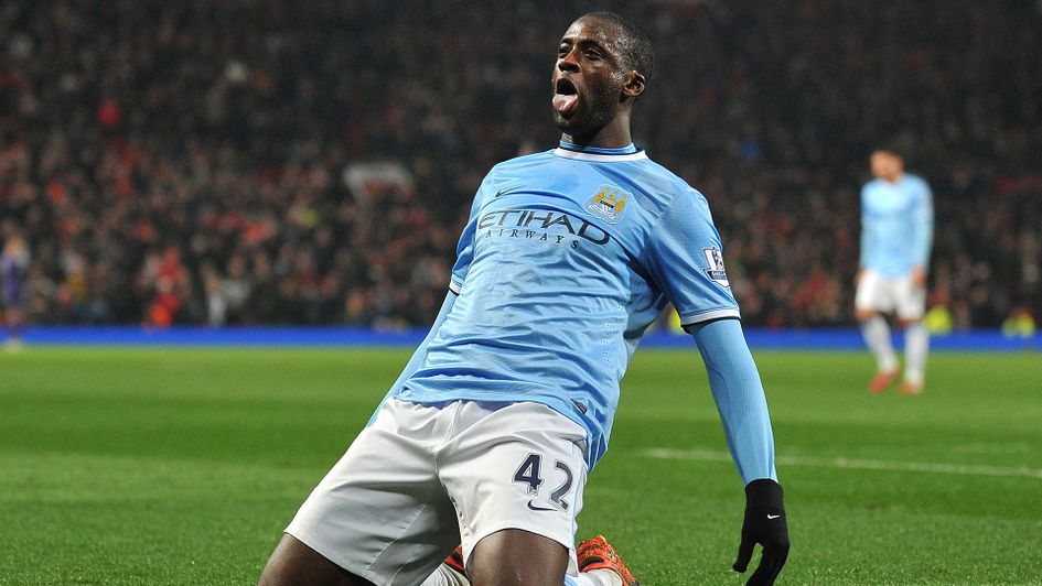 Yaya Toure celebrates after scoring for Manchester City at Old Trafford (2014)