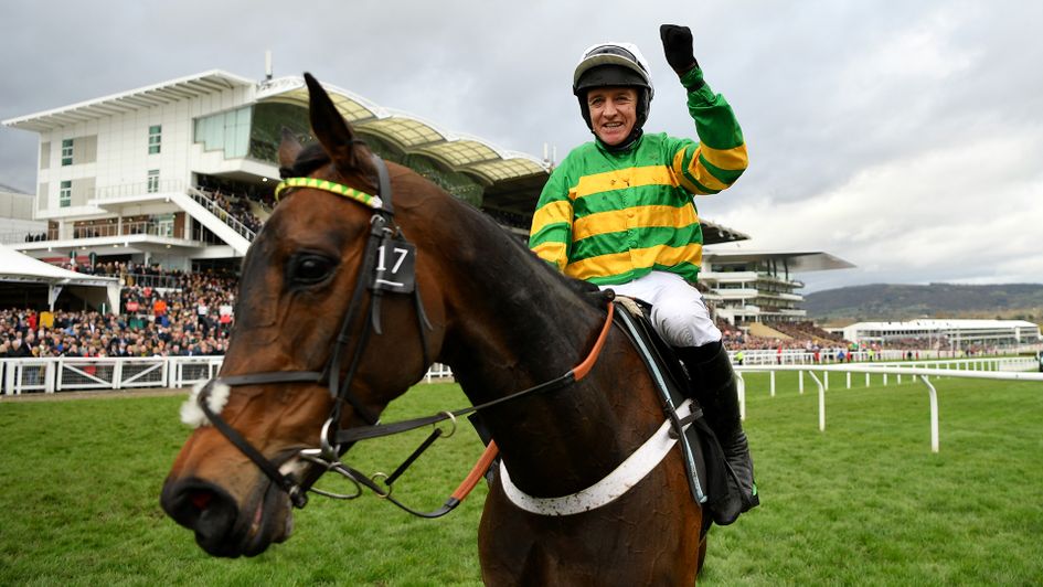 Barry Geraghty celebrates winning the Champion Hurdle on Epatante