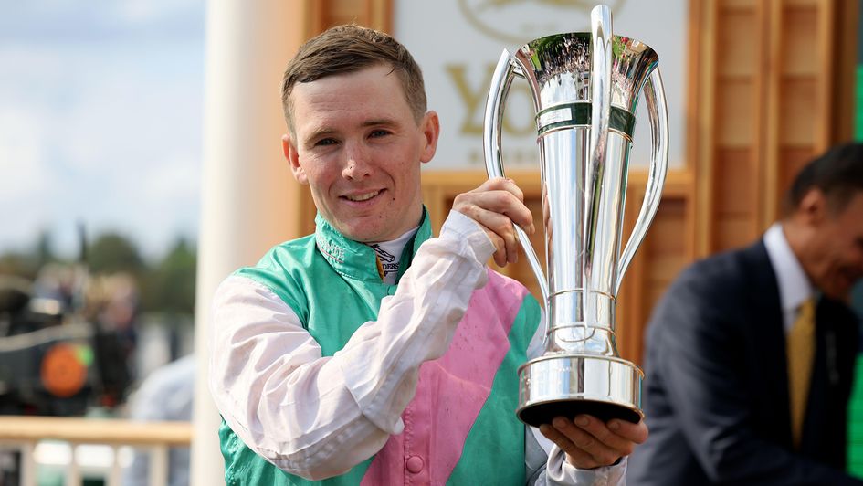 Colin Keane pictured with the Juddmonte International trophy following Item's win