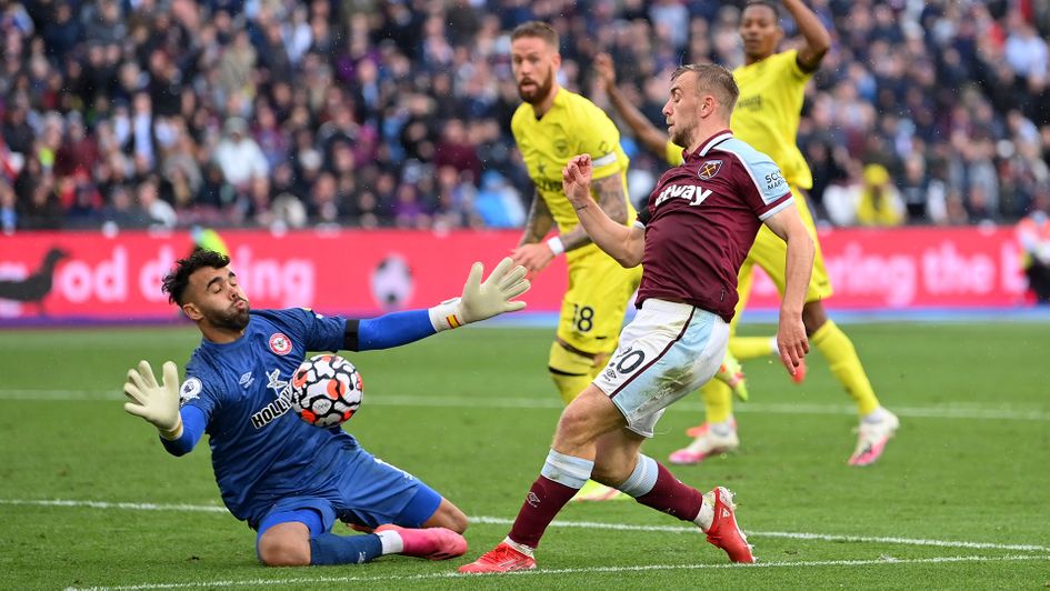 Jarrod Bowen has a shot saved by David Raya