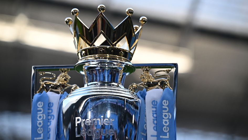 The Premier League trophy in Manchester City colours