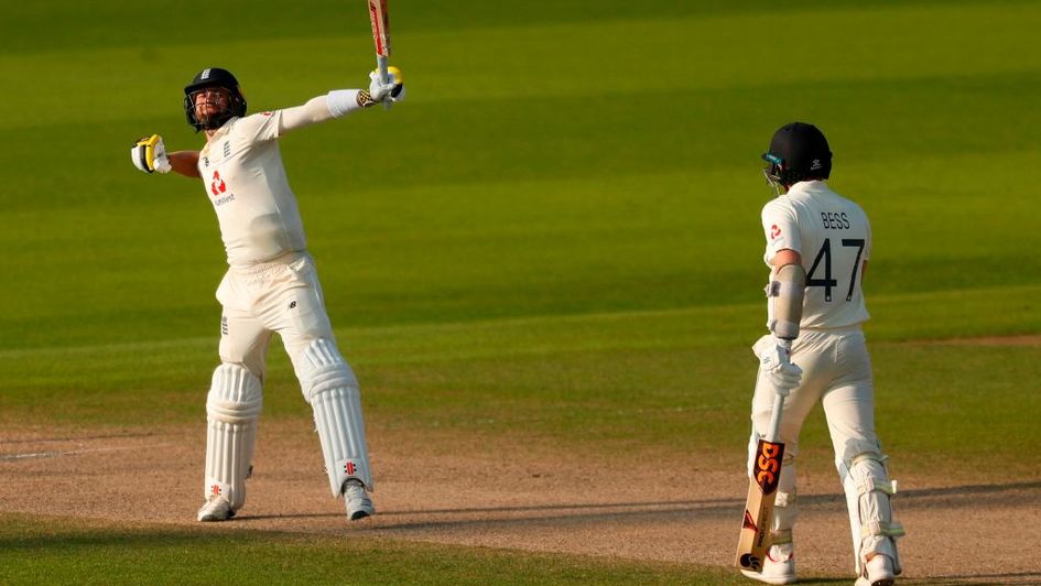 Chris Woakes celebrates after a fine innings helped England win