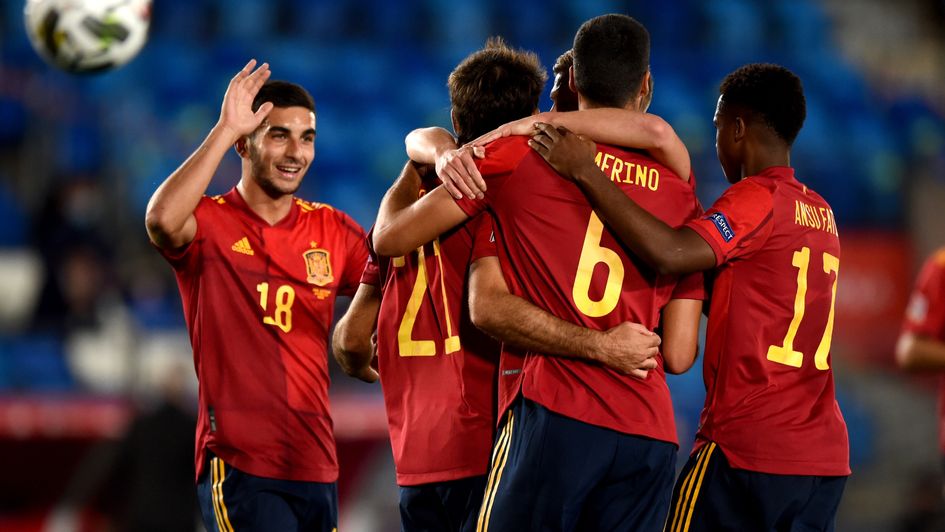 Spain celebrate Mikel Oyarzabal's goal in their narrow win over Switzerland