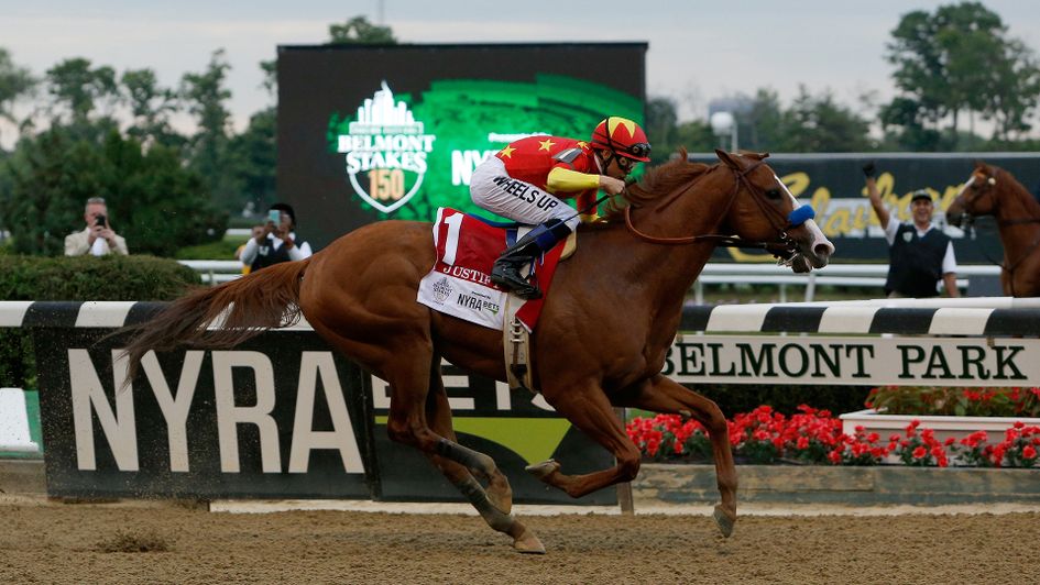 Justify roars to Triple Crown glory