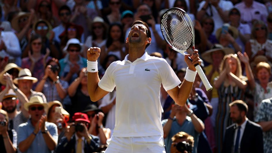 Novak Djokovic celebrates his fourth Wimbledon triumph