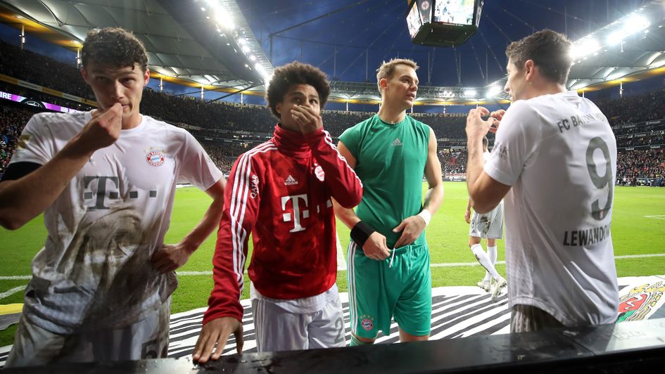 Benjamin Pavard, Serge Gnabry, Manuel Neuer and Robert Lewandowski react after Bayern's defeat to Frankfurt