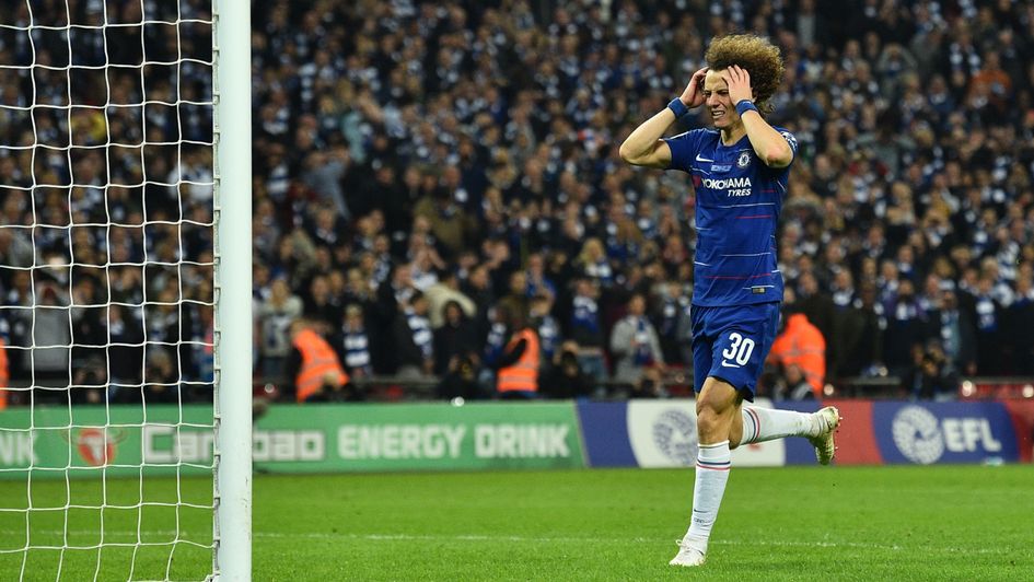 David Luiz: The Chelsea defender reacts after missing his penalty against Man City in the Carabao Cup final