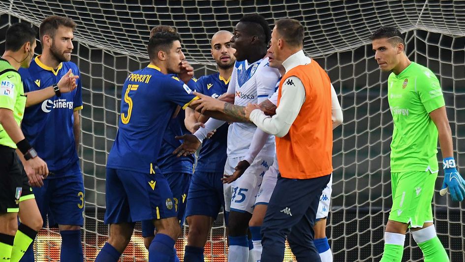 Mario Balotelli tries to walk off the pitch after suffering racist abuse at Verona