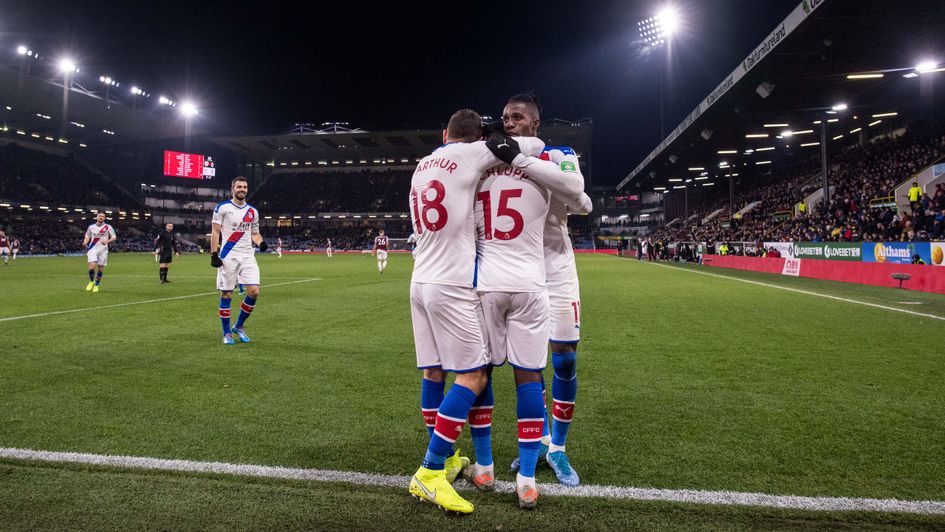 Crystal Palace players celebrate Jeffrey Schlupp's goal in the win at Burnley