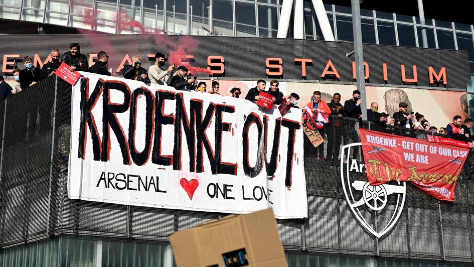 Arsenal fans protest outside the Emirates