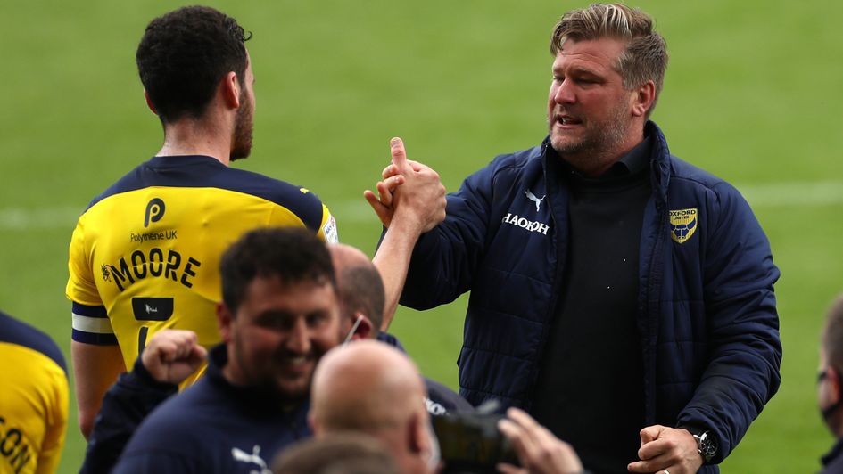 Oxford boss Karl Robinson (right)