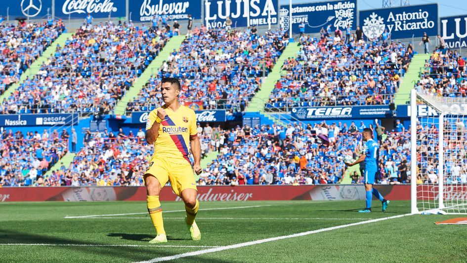 Luis Suarez: Barcelona forward celebrates his goal at Getafe