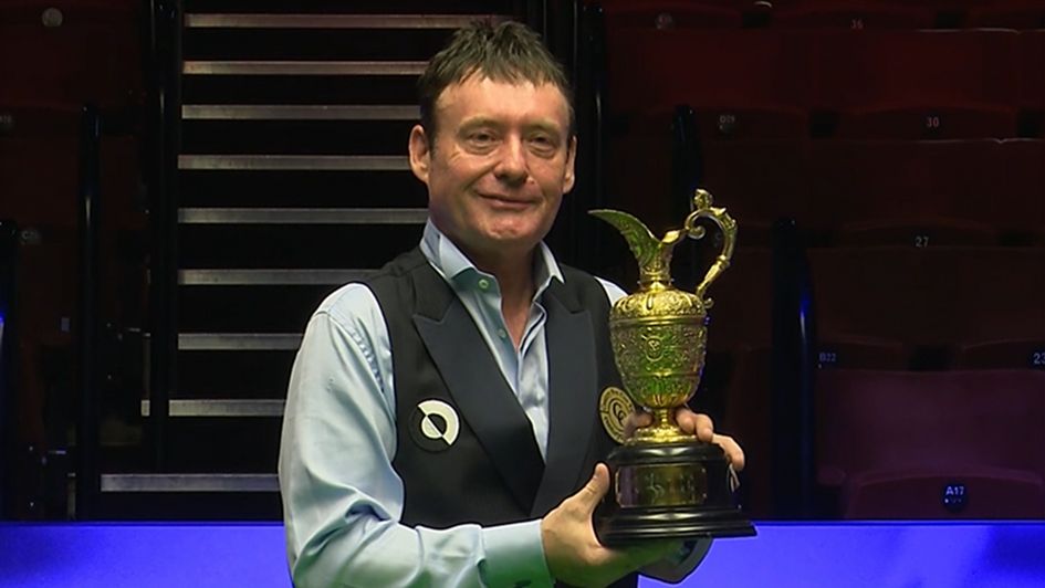 Jimmy White lifts the World Senior Championship trophy