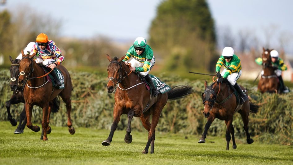 Any Second Now (white cap) ran well to finish third in last year's Grand National