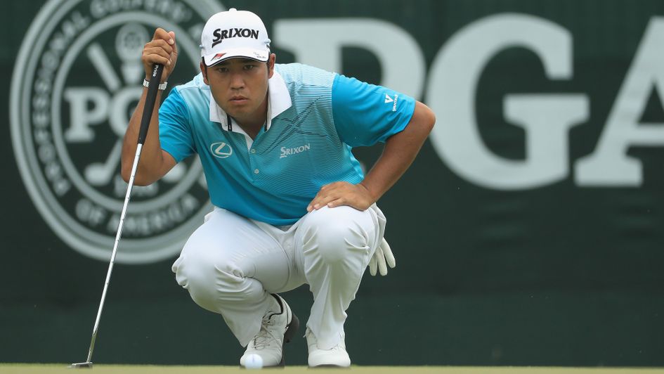Hideki Matsuyama shares the lead