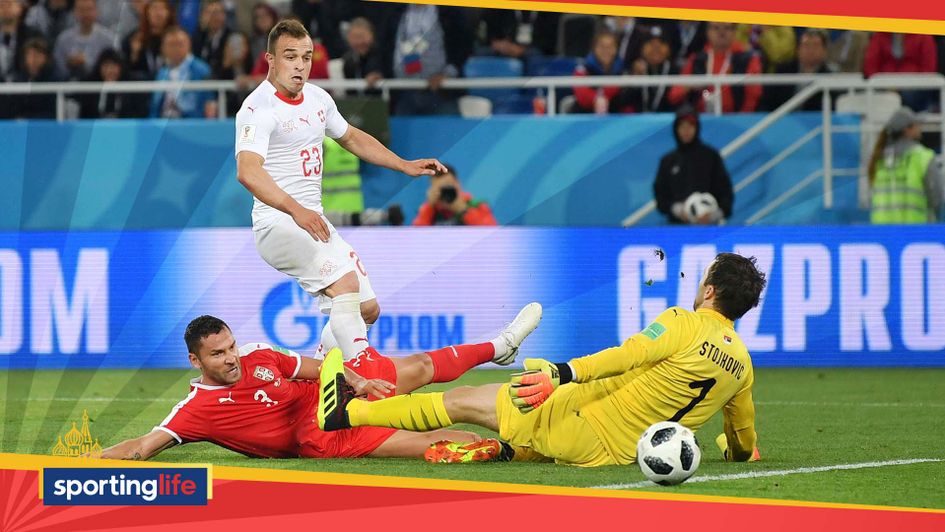 Xherdan Shaqiri scores for Switzerland against Serbia at the World Cup
