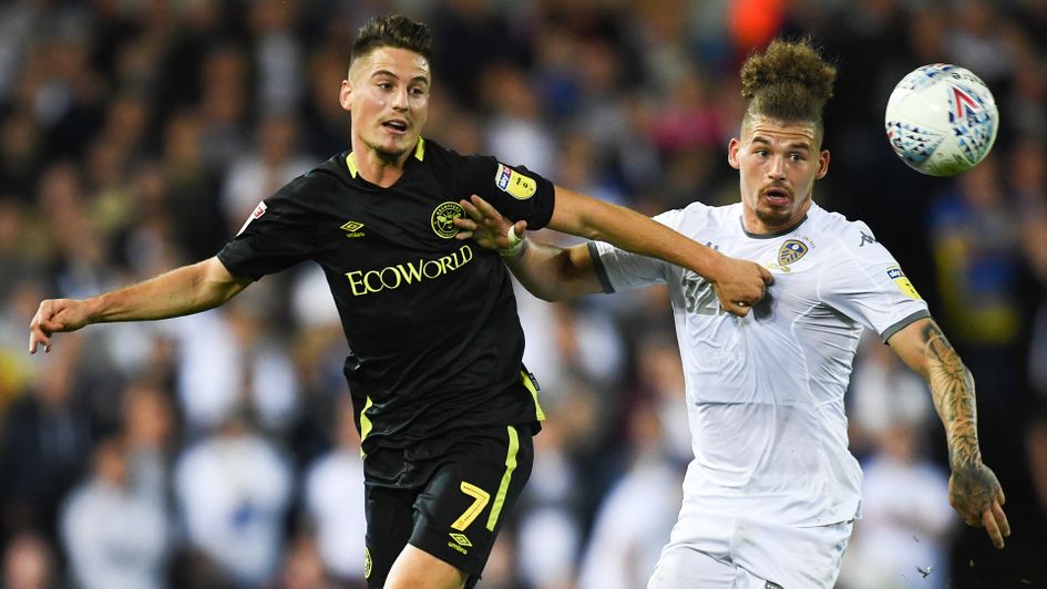 Kalvin Phillips battles Sergi Canos for the ball