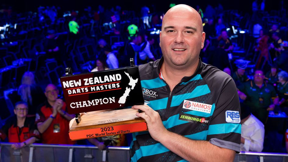 Rob Cross with his New Zealand Darts Masters trophy (Pic: Photosport/PDC)
