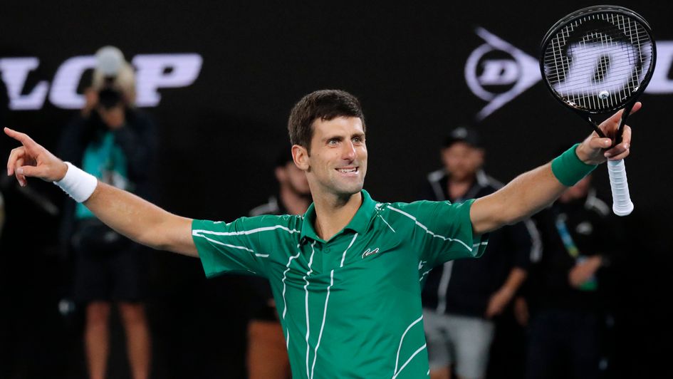 Novak Djokovic celebrates his eighth Australian Open title