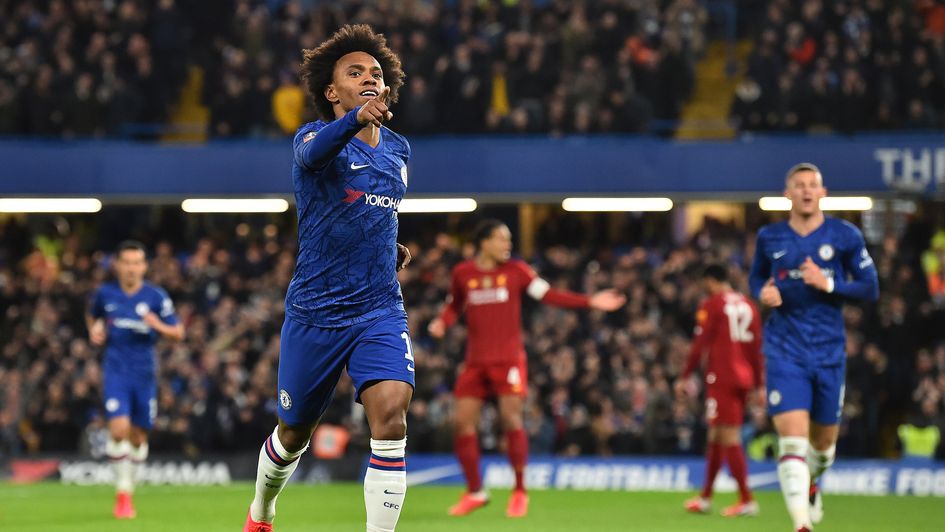 Willian: Chelsea attacker celebrates his strike against Liverpool in the FA Cup