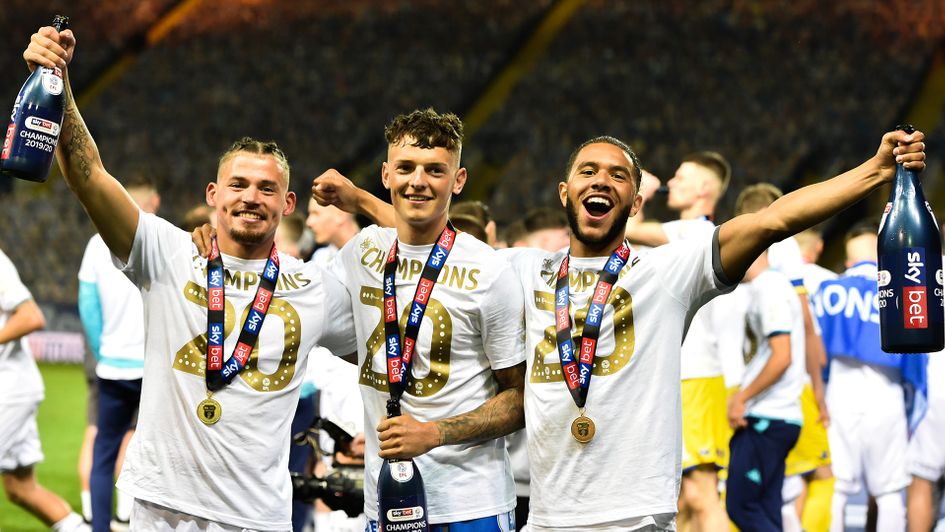 Kalvin Phillips, Ben White and Tyler Roberts celebrate Leeds' title success