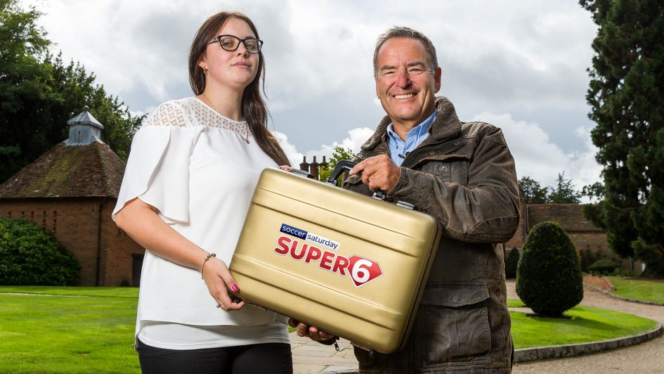Super 6 millionaire Grace Berry receives her prize from Jeff Stelling