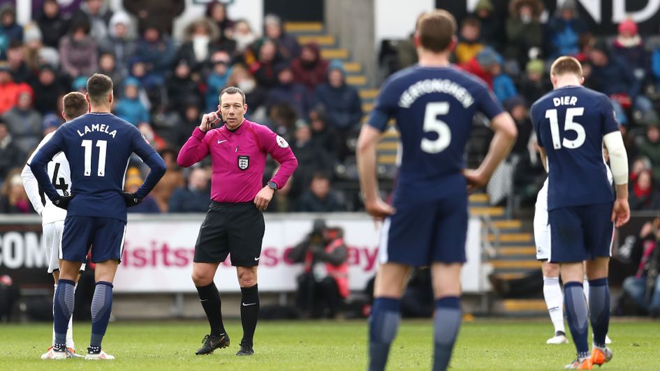 Kevin Friend checks VAR in Spurs' FA Cup clash with Swansea