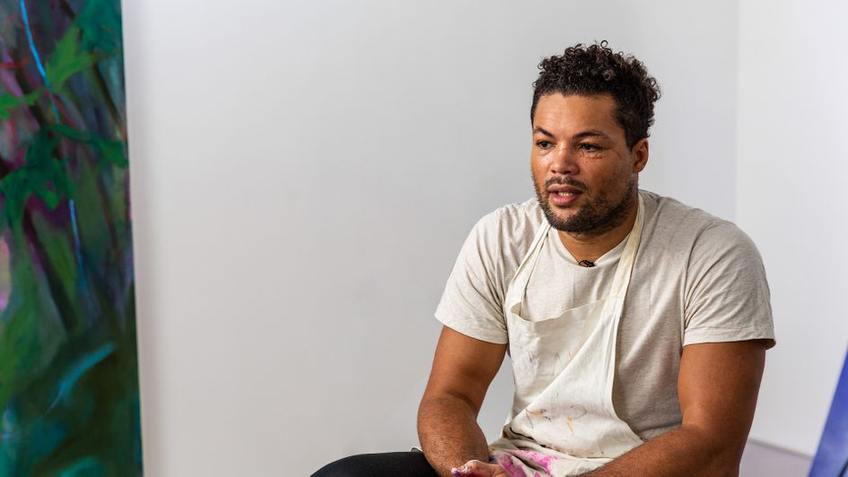 Joe Joyce working on his artwork for the Purplebricks 'Home Support' campaign