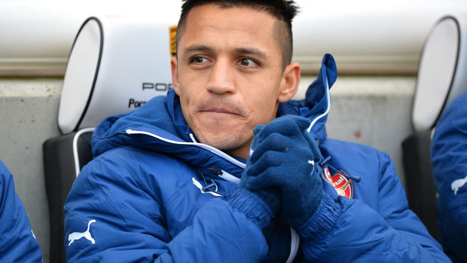 Alexis Sanchez on the Arsenal bench