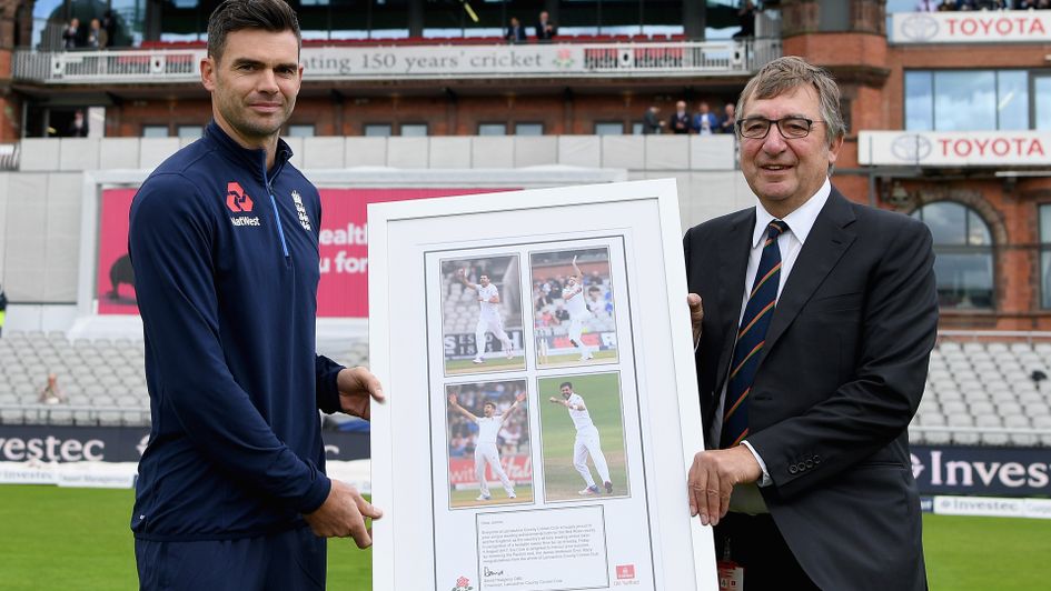 James Anderson receives a framed photo from David Hodgkiss.