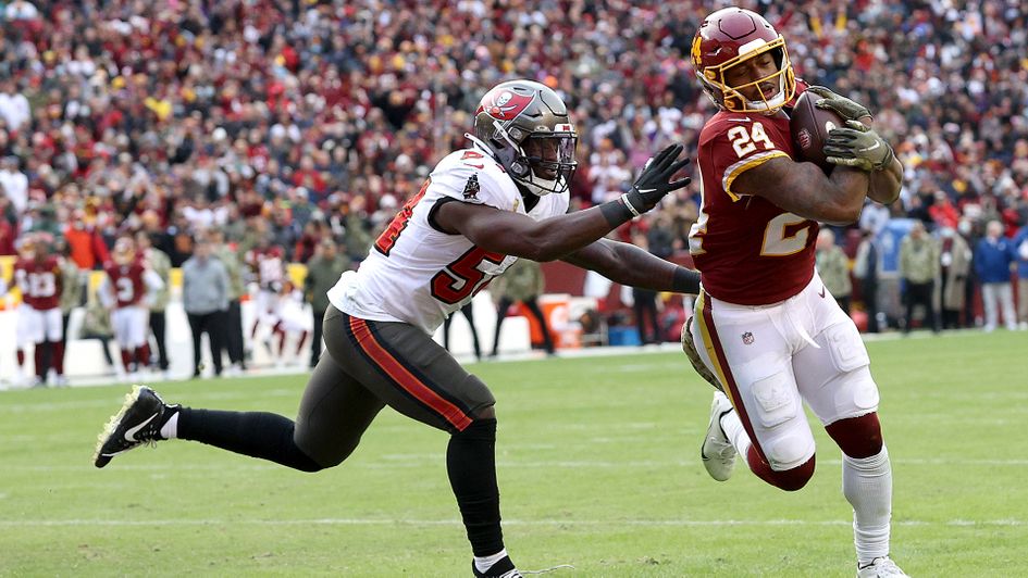 Antonio Gibson scores a touchdown