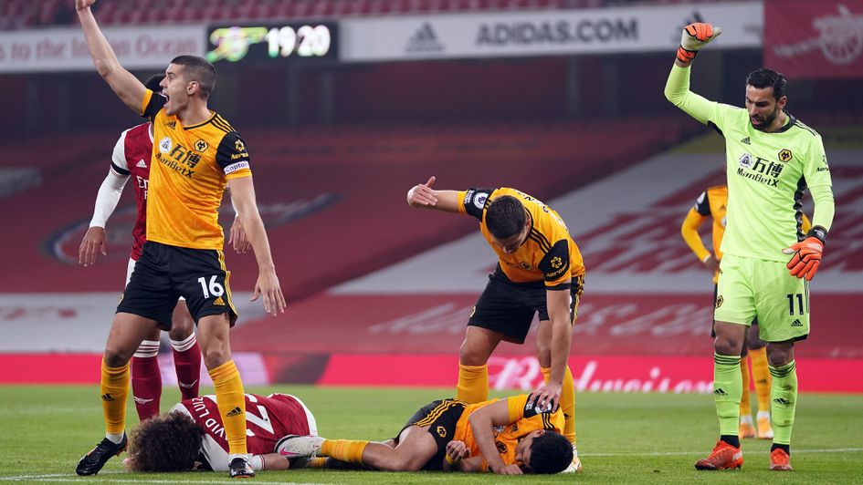 Raul Jimenez and David Luiz after clashing heads