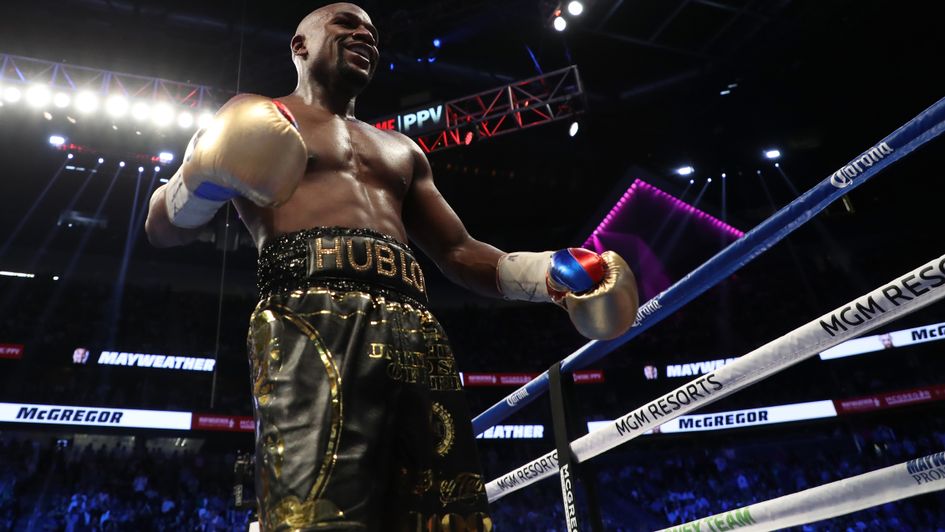 Floyd Mayweather celebrates victory