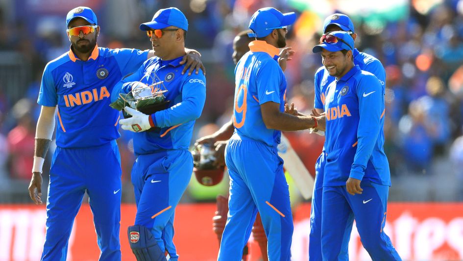 India celebrate beating the West Indies