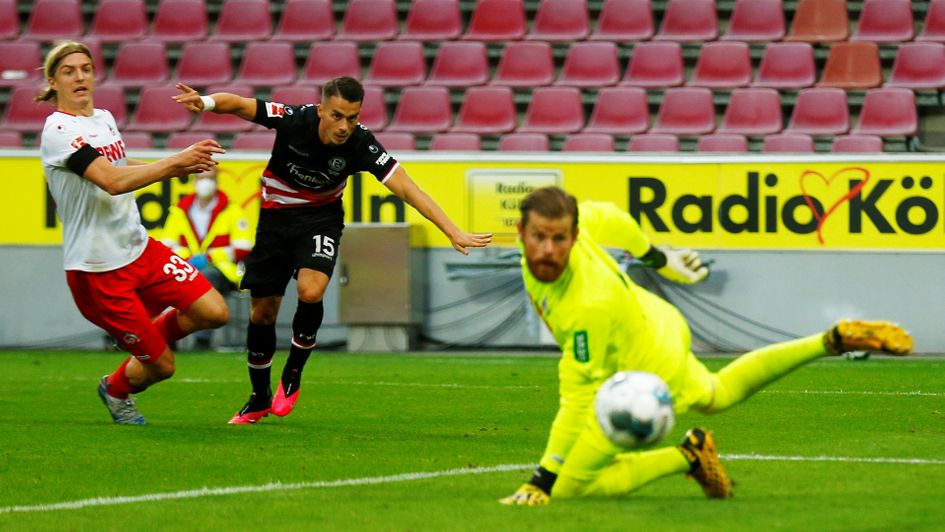 Erik Thommy scores against Koln