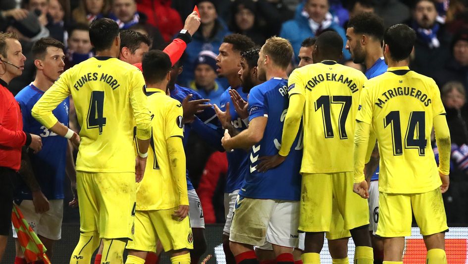 Candeias is shown a controversal red card