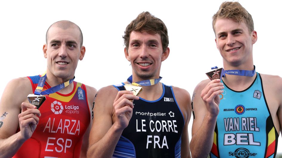 France's Pierre Le Corre (centre), Spain's Fernando Alarza (right) and Belgium's Marten Van Riel celebrate