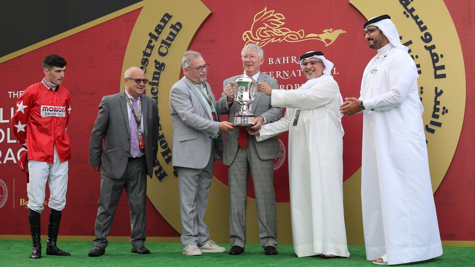 Fahey and Sir Alex Ferguson trophy presentation in Bahrain