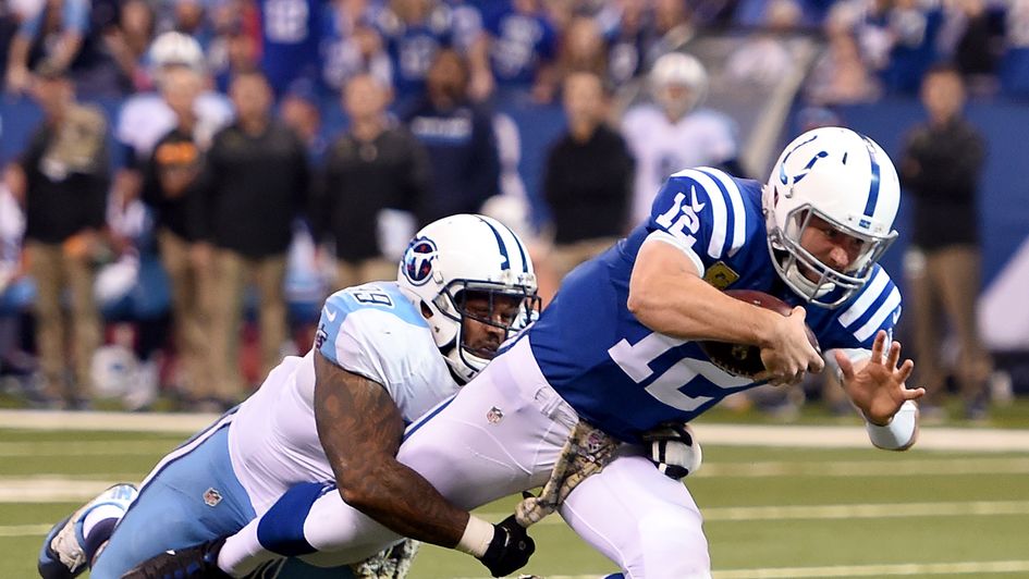 Jurrell Casey (left) brings down Andrew Luck