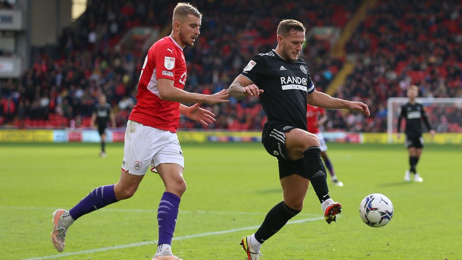 Barnsley's Michal Helik will hope to keep Sheffield United's Billy Sharp quiet